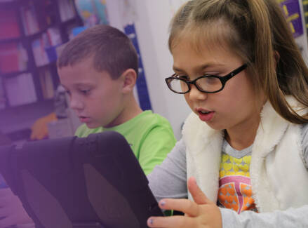 Two students using tablets